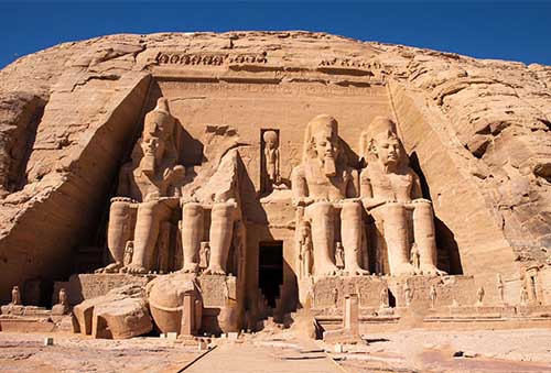 Impressive view of the iconic Abu Simbel temples facade with Four Seated colossi of Pharaoh Ramses II